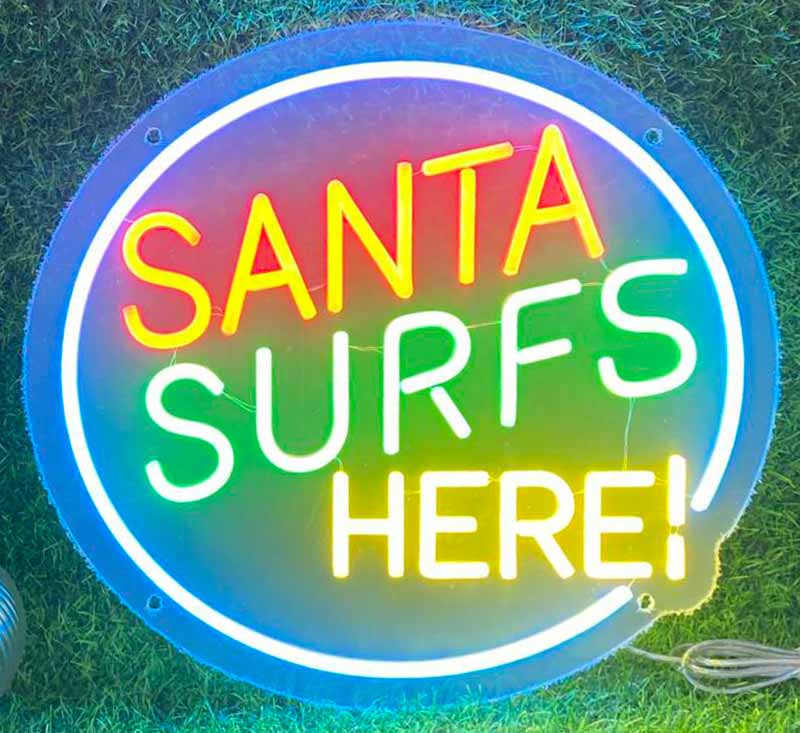 Retro Santa Surfs Here Neon Sign