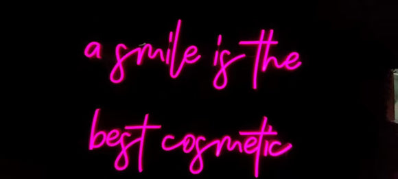 A smile is the best cosmetic Neon Sign