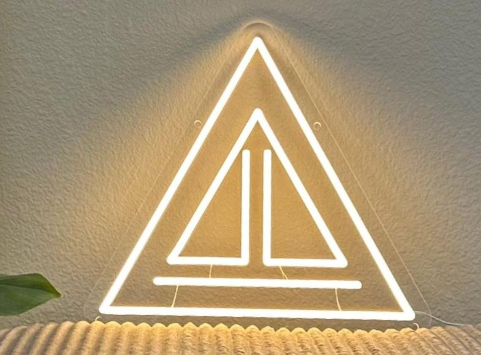 centered stability triangle neon sign