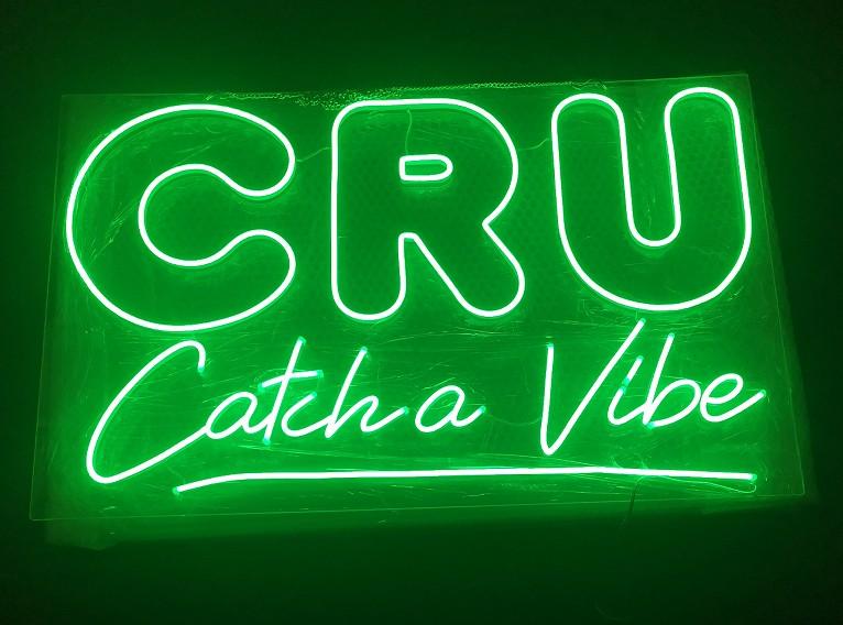 Custom "CRU Catch a Vibe" neon sign