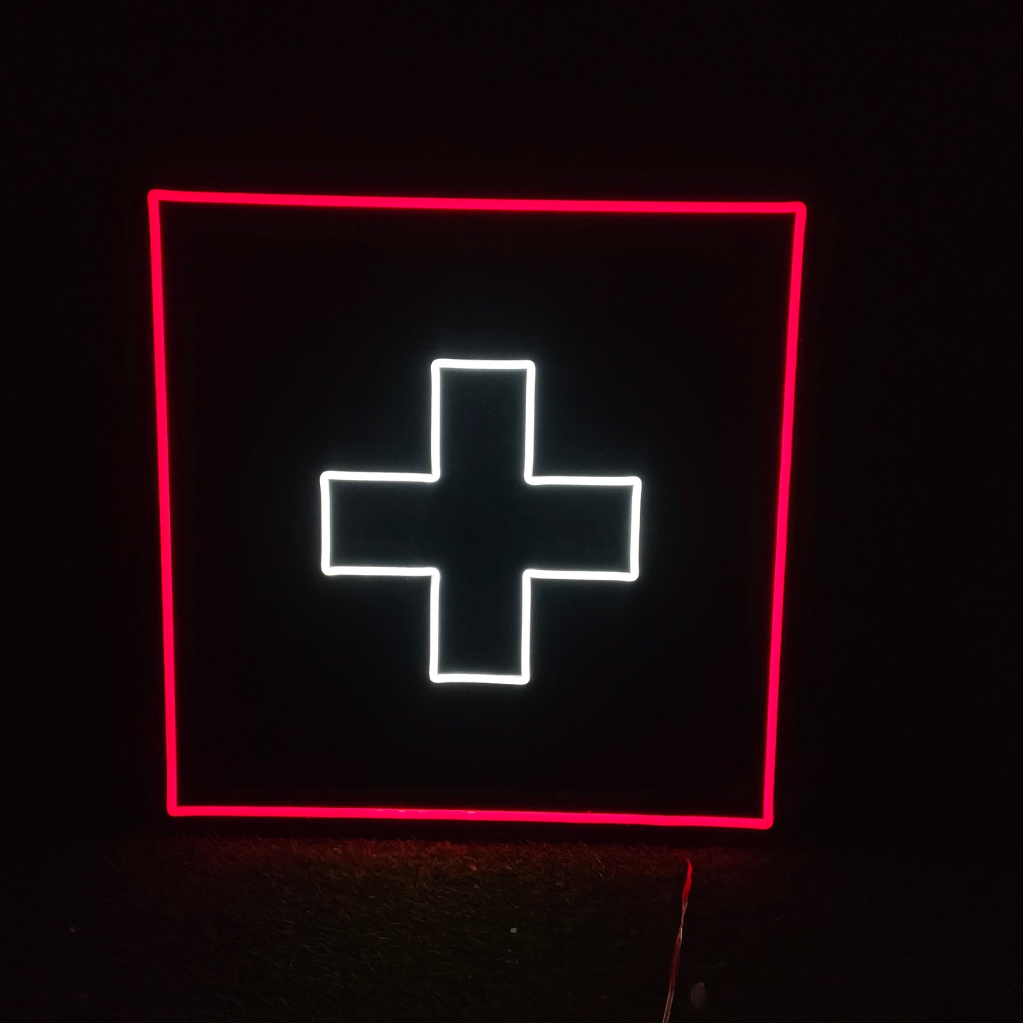 swiss flag neon sign 