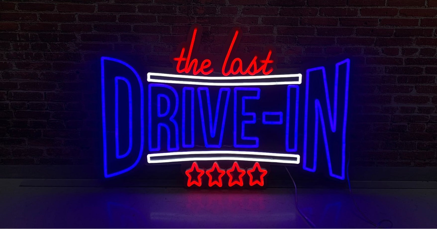 the last drive-in- neon-sign
