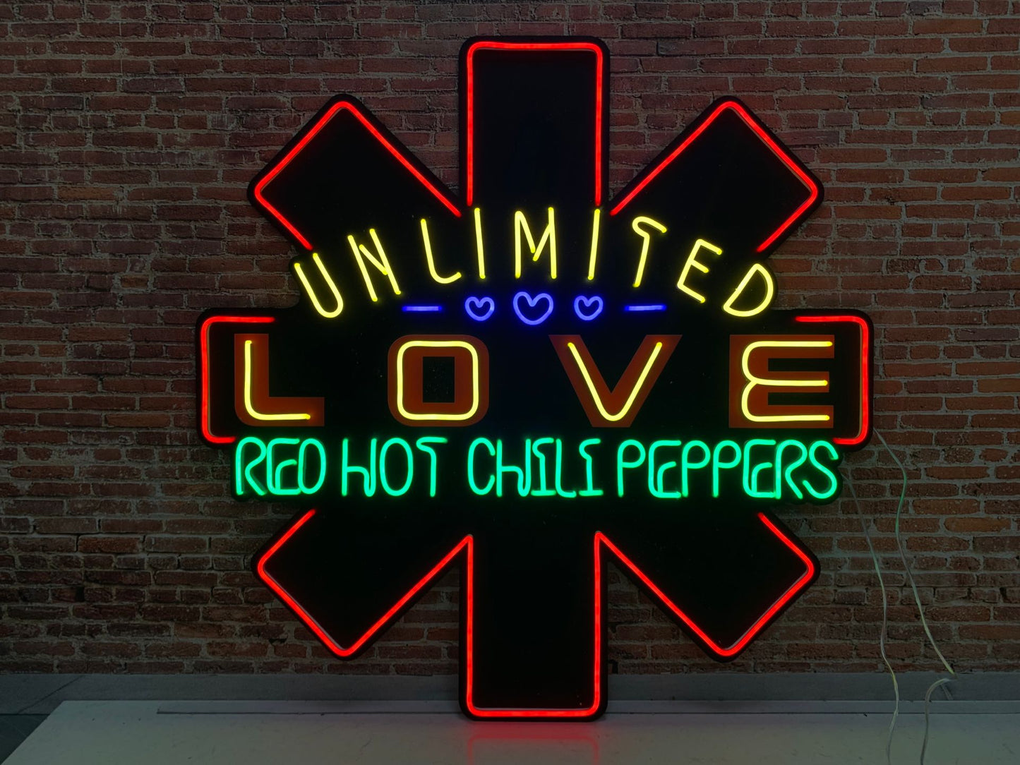 unlimited love red hot chili peppers neon sign