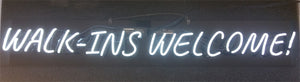walk-ins welcome neon sign